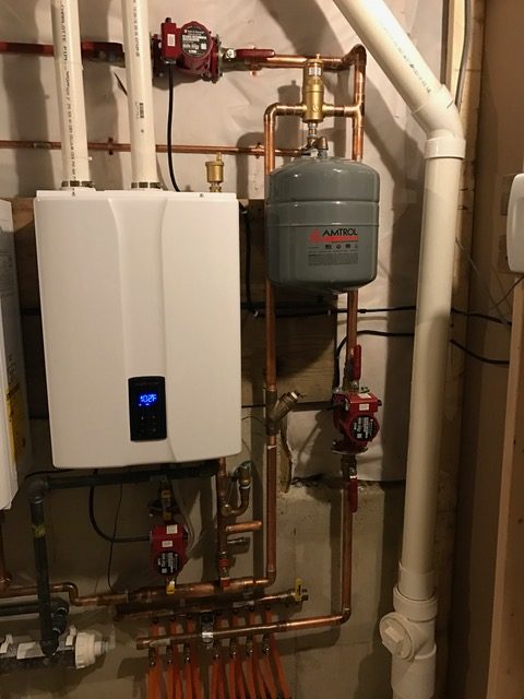 Tankless water heater with expansion tank installed by South County Mechanical